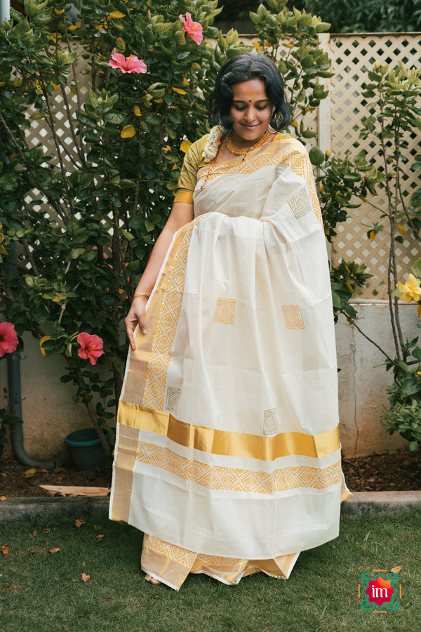White Onam Kasavu Geometric Motif Jugalbandhi Saree Kalikalam