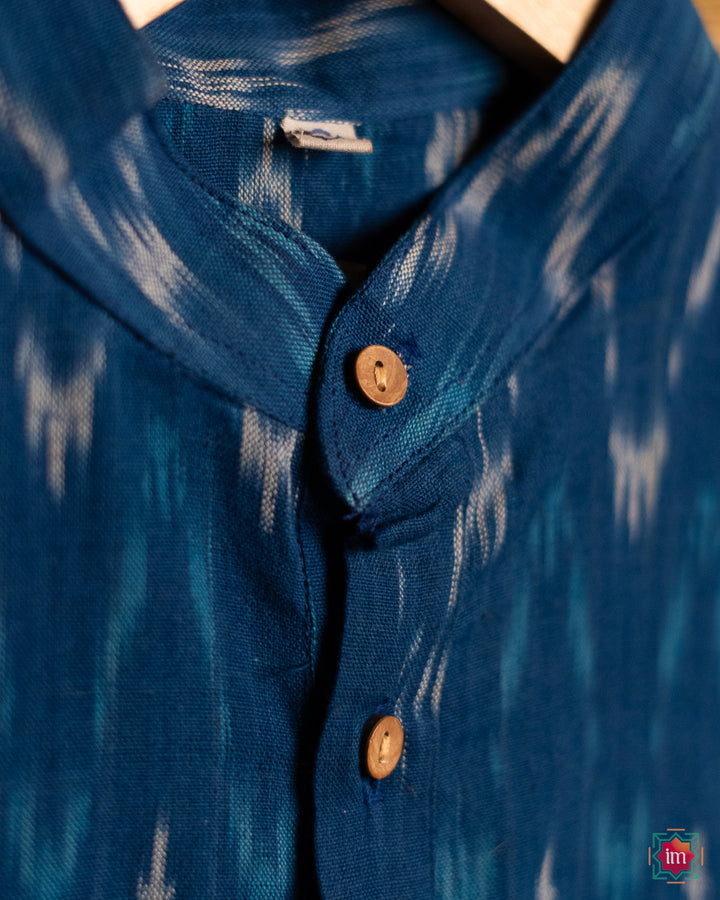 Mens blue kurta, where in the detailed print is displayed.