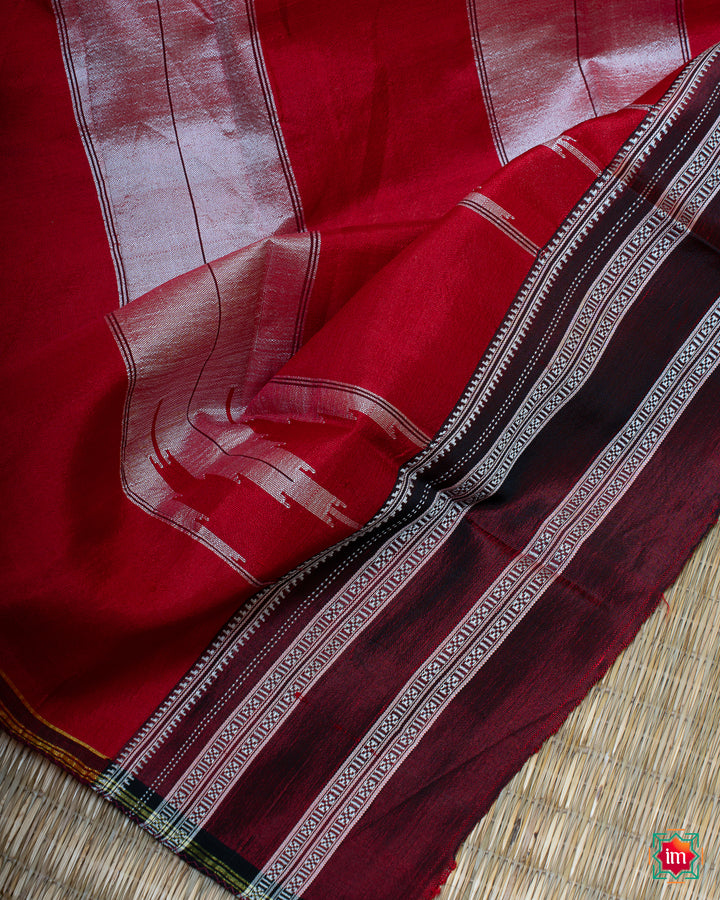 Beautiful white black handloom cotton saree, where in the detailed saree print is displayed.
