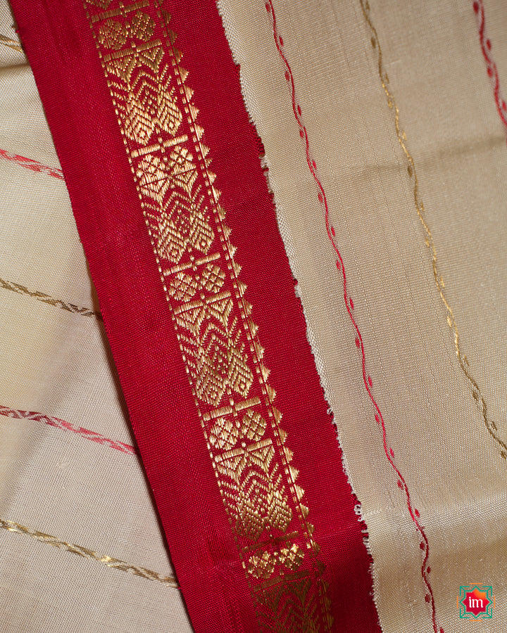 White Red Kanjivaram  Silk Saree, where in the detailed saree print is displayed.