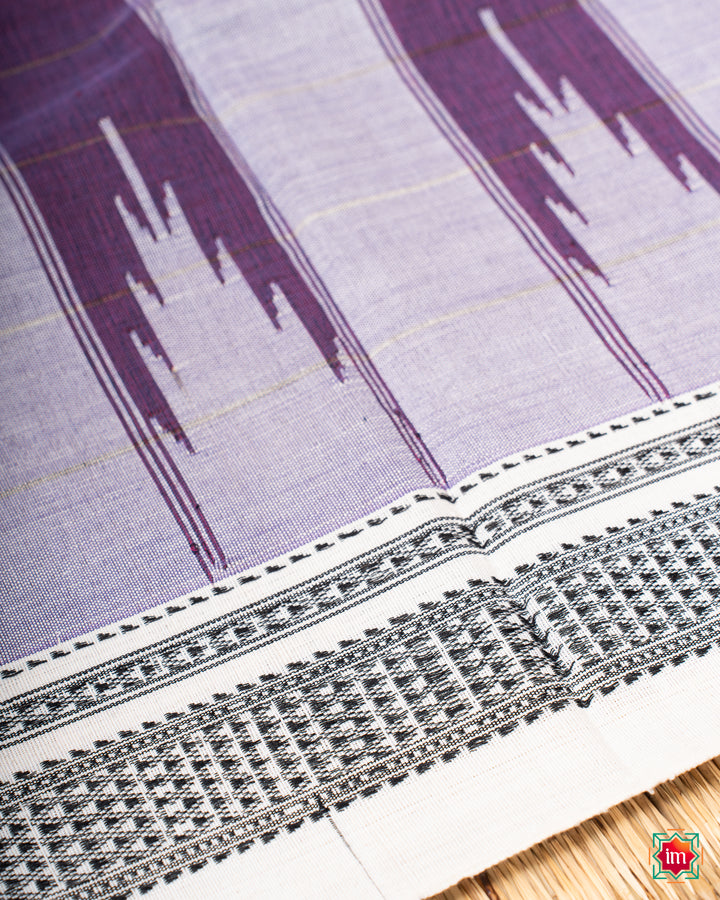 Beautiful orchid purple handloom cotton saree, where in the detailed saree print is displayed.