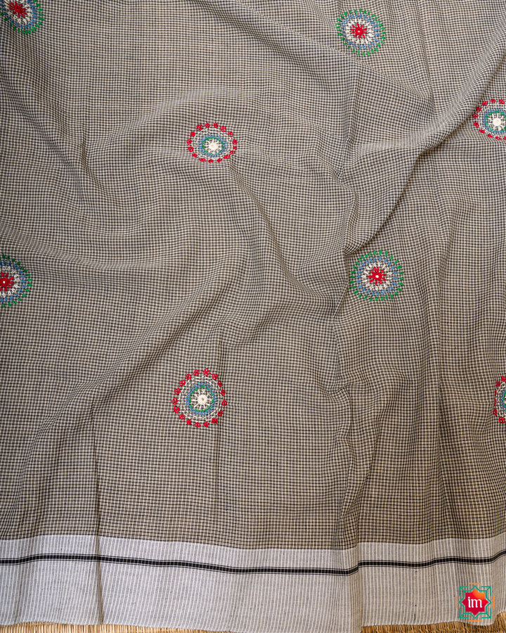 Beautiful handloom cotton saree, where in the detailed saree print is displayed.