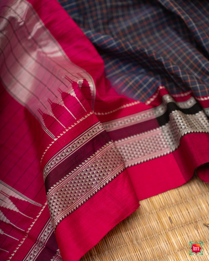 Beautiful blue handloom cotton saree, where in the detailed saree print is displayed.
