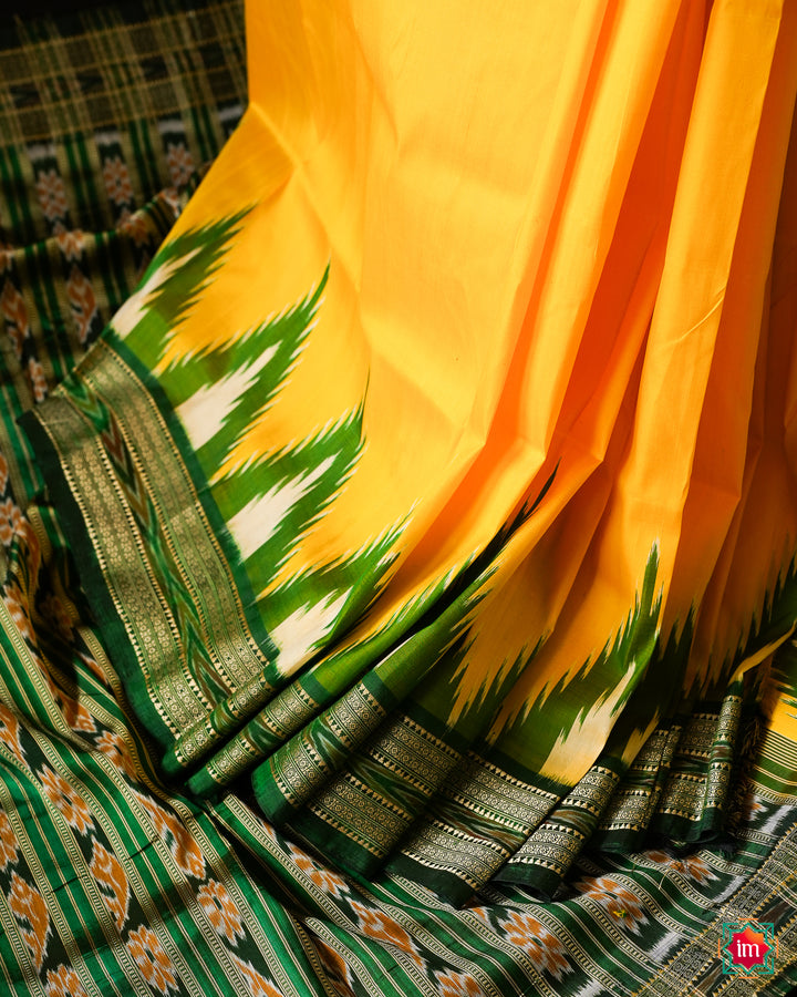 Elegant Yellow Green silk mark saree is pleated and displayed on the floor.