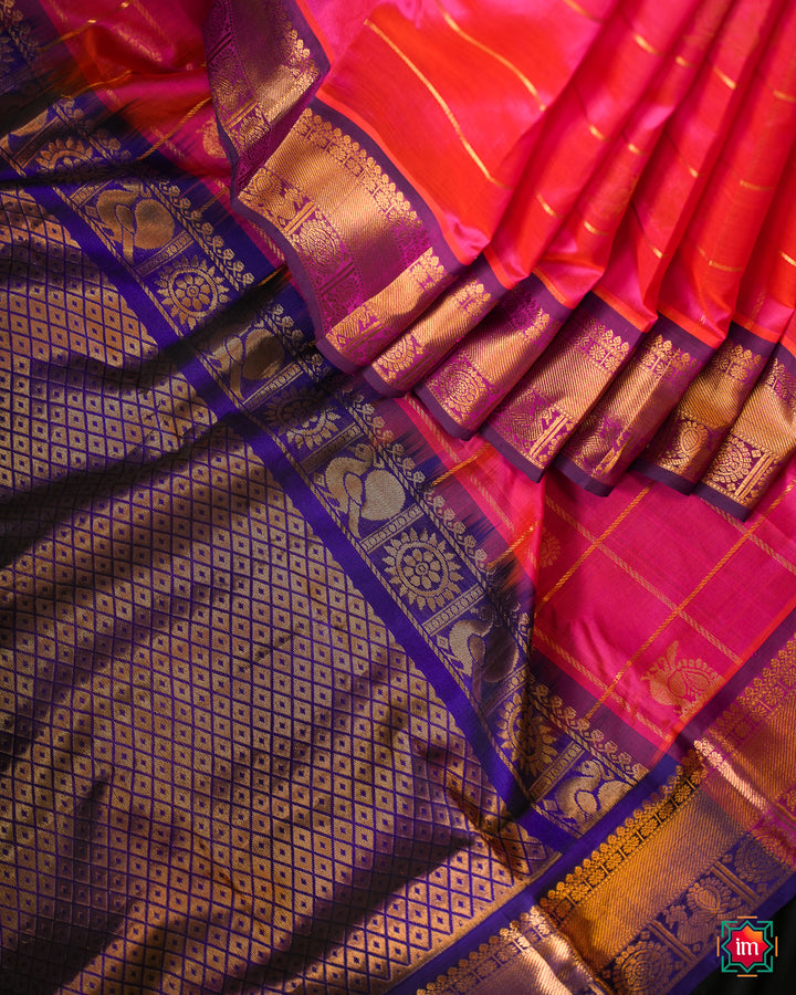 Elegant Candy Pink  Silk Saree is pleated and displayed on the floor.