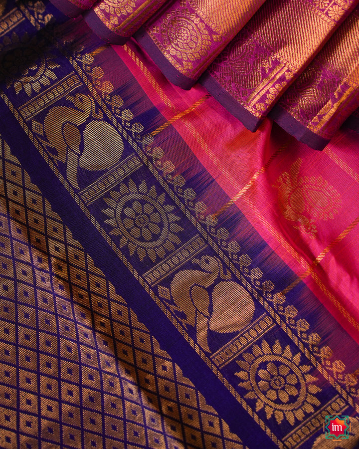 Elegant Candy Pink  Silk Saree is pleated and displayed on the floor.