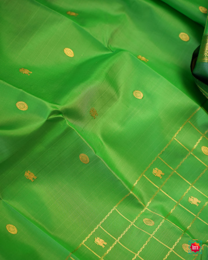 Beautiful Rexona Green Kanjivaram Saree, where in the detailed saree print is displayed.