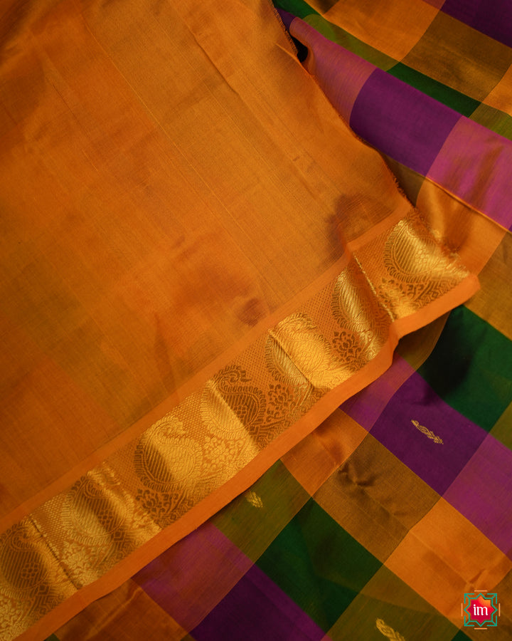 Beautiful Multicolour Palum Pazhamum Kattam Kanchi Saree best handloom saree for women is displayed.