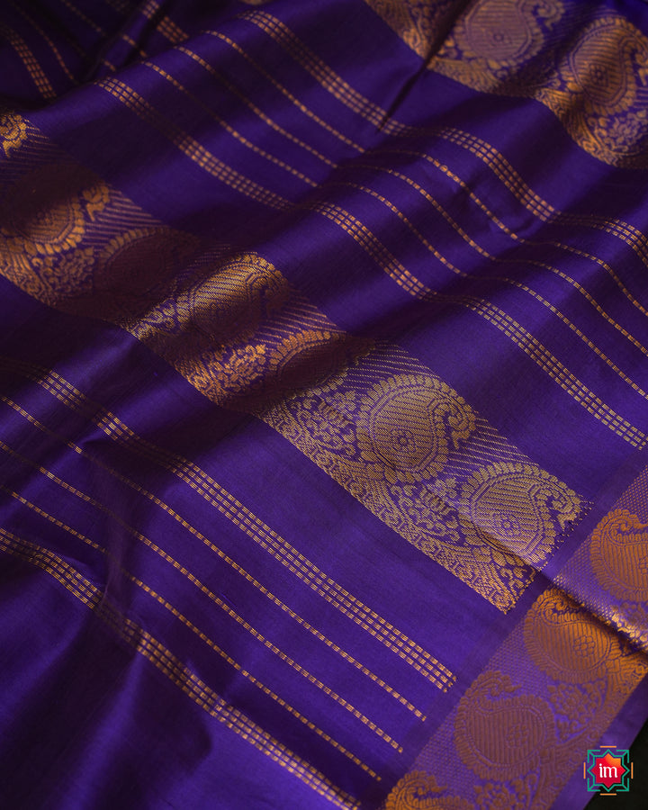 Beautiful Multicolour Kanchi Silk Saree, where in the detailed saree print is displayed.