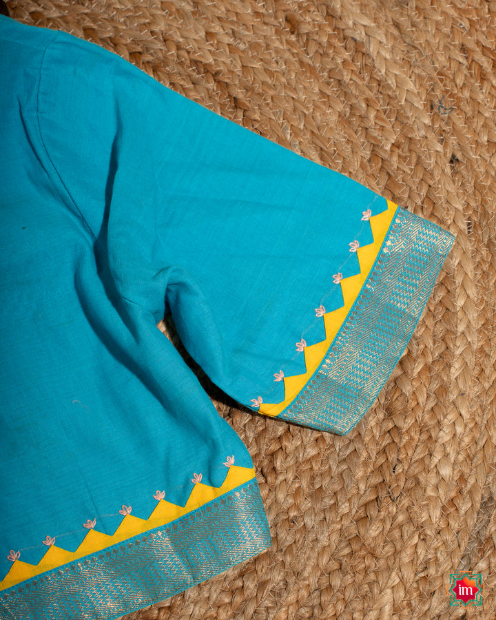 Elegant blue embroidery blouse which would suit any silk saree, where in the detailed saree print is displayed.