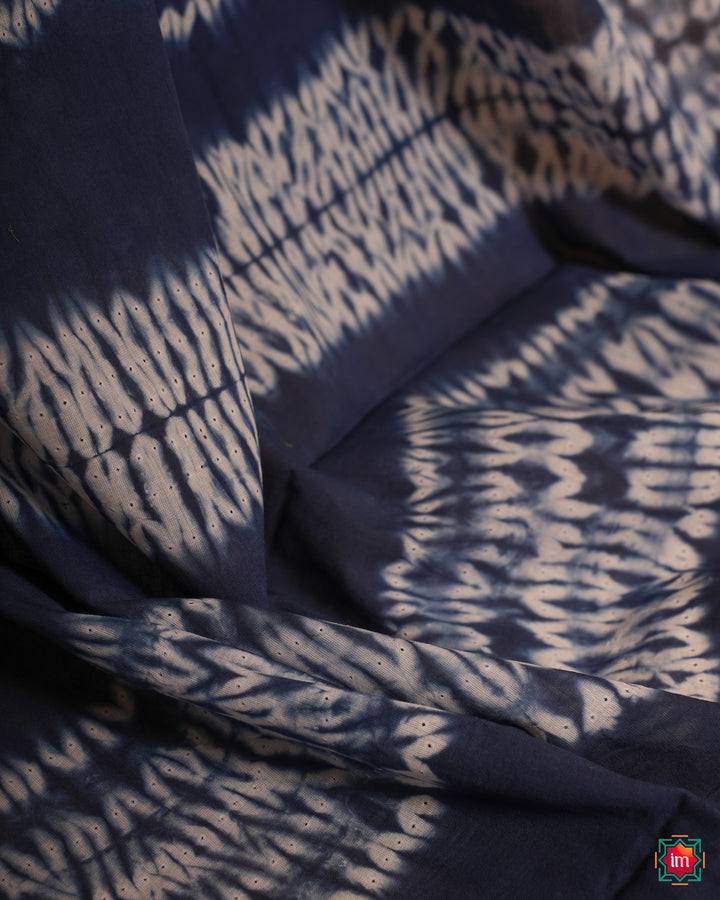 Blue handloom saree, where in the detailed saree print is displayed.