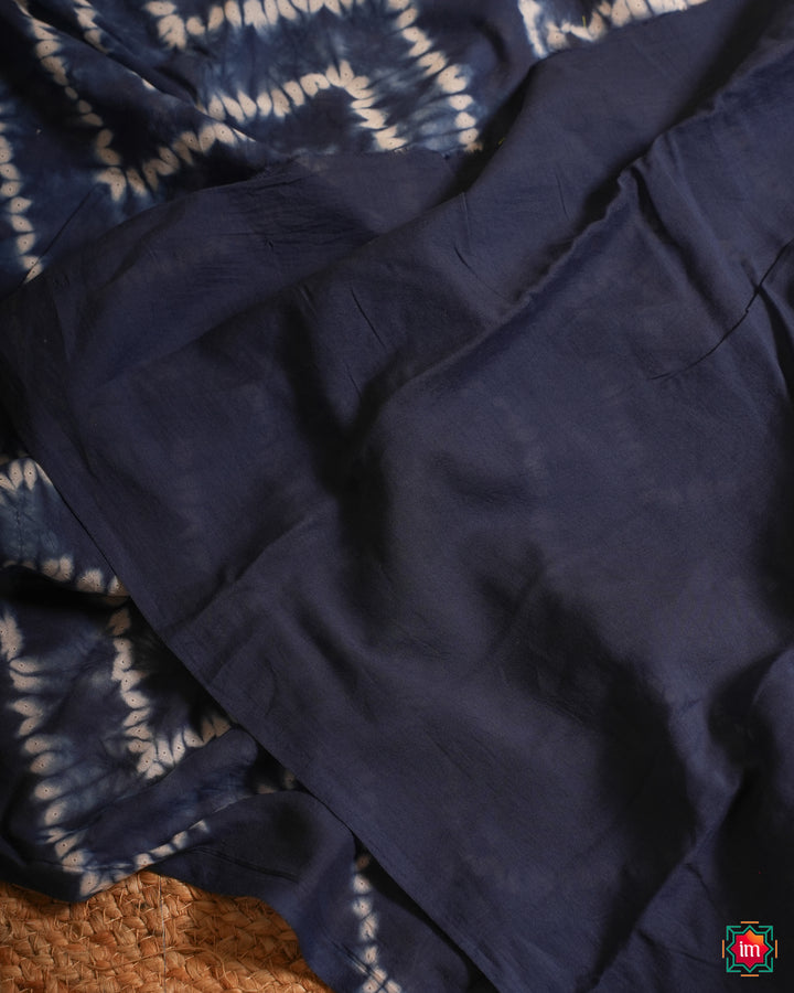 Blue handloom saree, where in the detailed saree print is displayed.