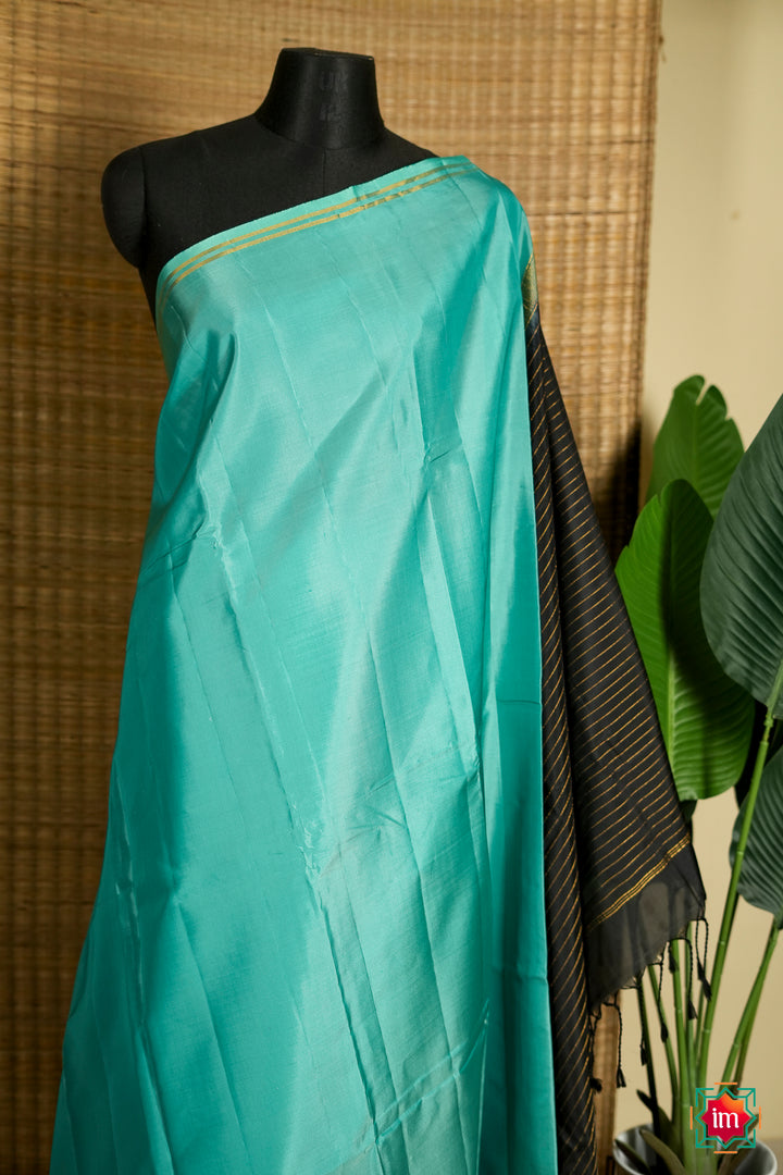 Turquoise-With-Black-Soft-Silk-Handloom-Saree-Jheel-1-The-Indian-Motif