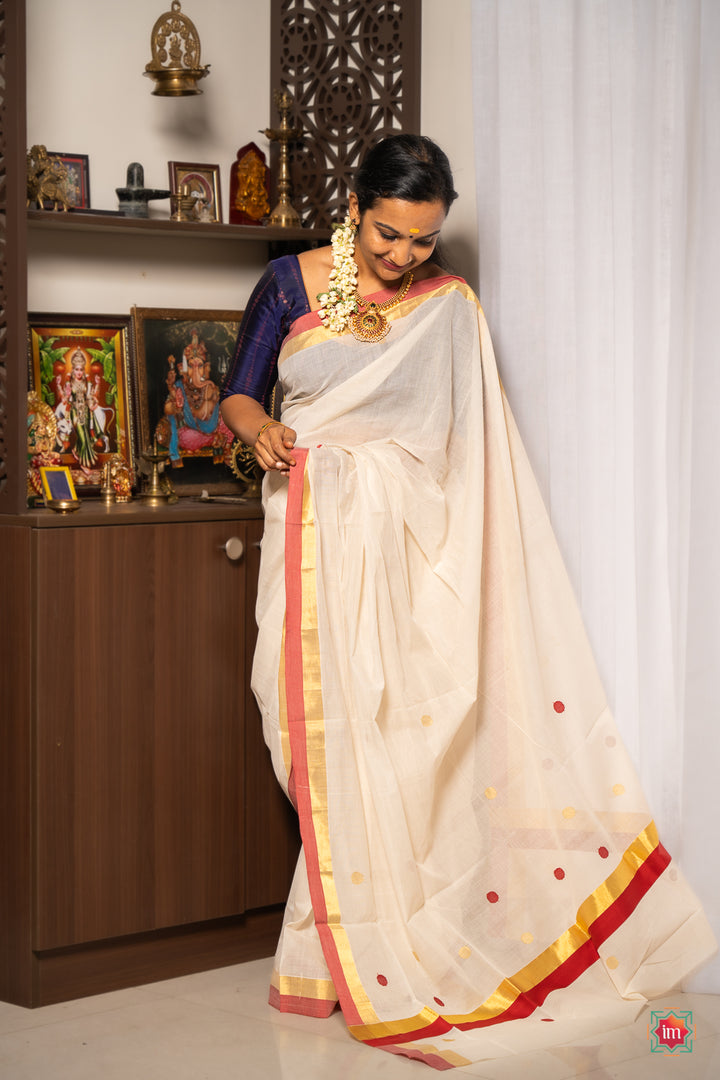 White-Kasavu-Red-Motif-Zari-Border -Handloom-Saree-Nilavu-1-The-Indian-Motif