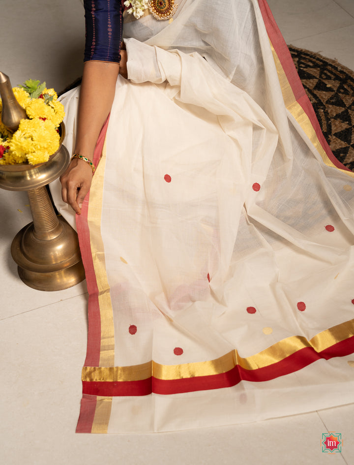 White-Kasavu-Red-Motif-Zari-Border -Handloom-Saree-4-Nilavu-The-Indian-Motif