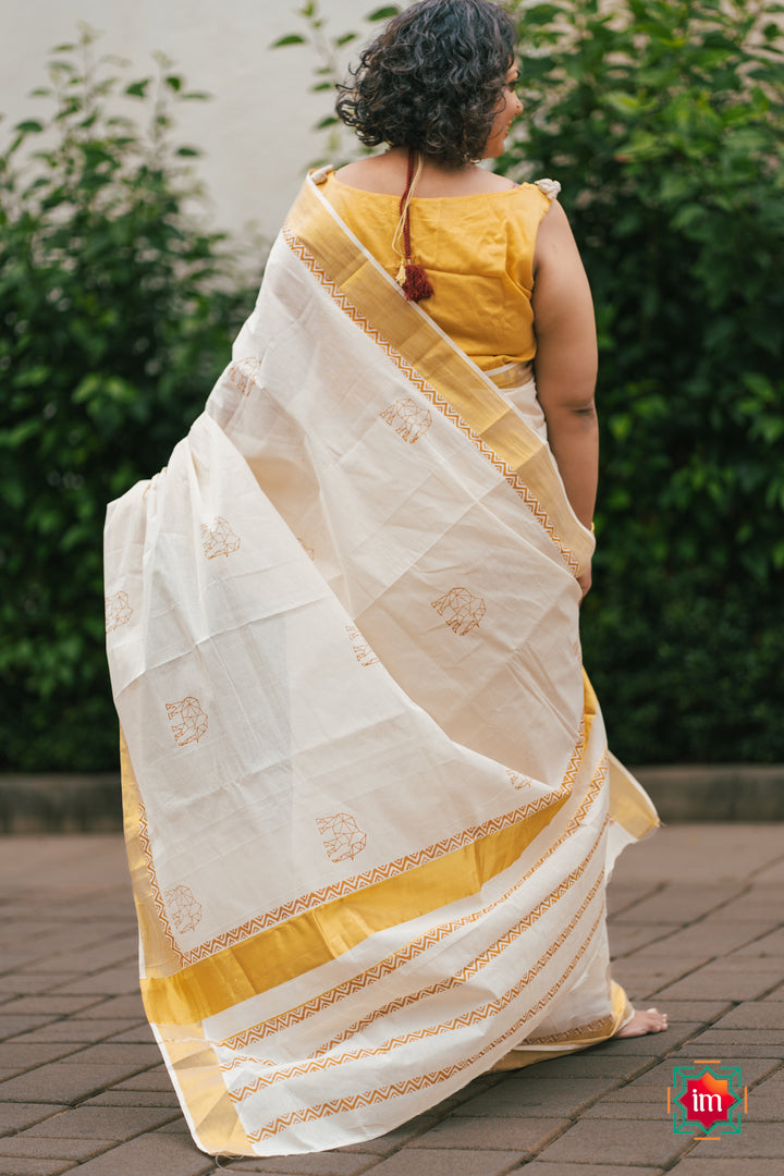 White-Onam-Kasavu-Elephant-Motif-Jugalbandhi-Saree-OruAana-5-The-Indian-motif