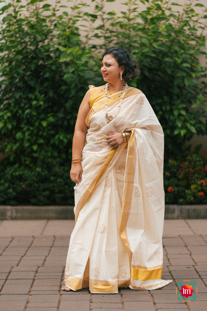 White-Onam-Kasavu-Elephant-Motif-Jugalbandhi-Saree-OruAana-2-The-Indian-motif