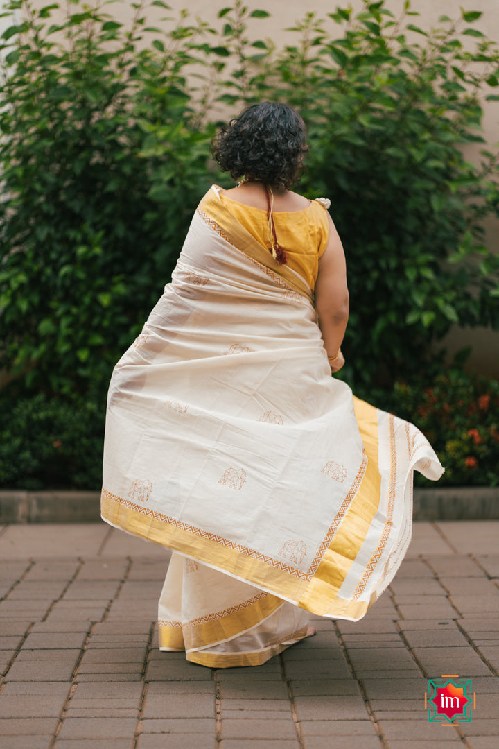 White-Onam-Kasavu-Elephant-Motif-Jugalbandhi-Saree-OruAana-4-The-Indian-motif