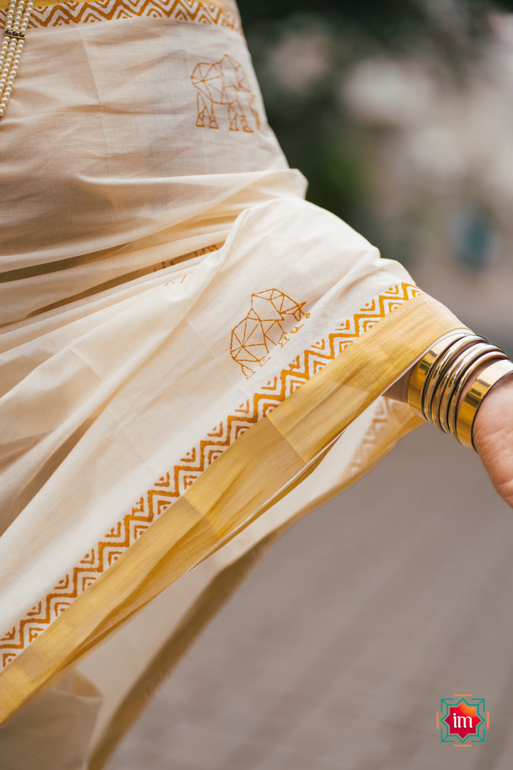 White-Onam-Kasavu-Elephant-Motif-Jugalbandhi-Saree-OruAana-6-The-Indian-motif