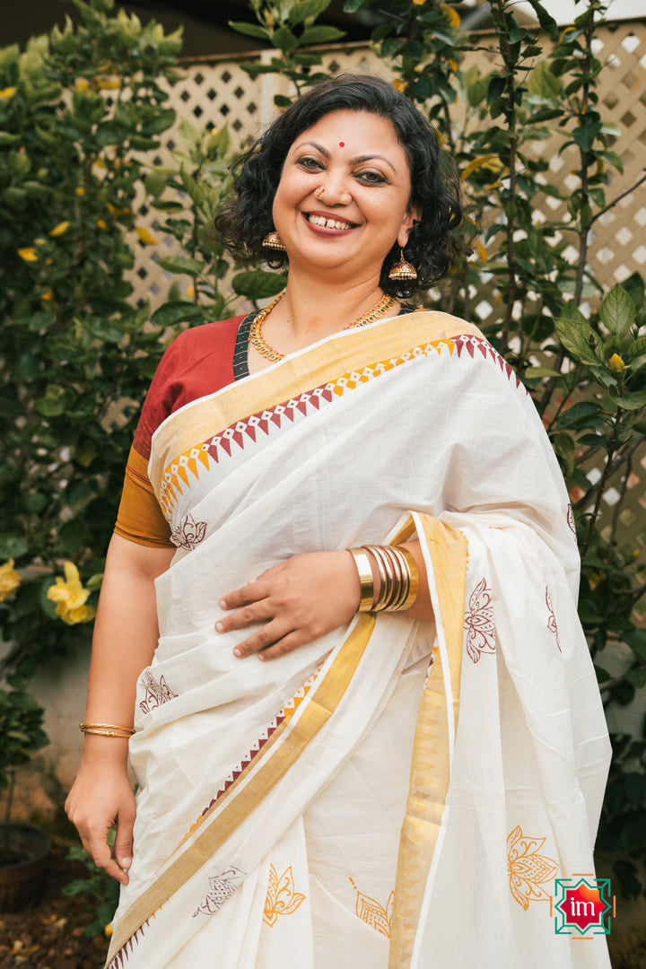 White-Onam-Kasavu-Temple-Motif-Jugalbandhi-Saree-Taamara-1-The-Indian-Motif