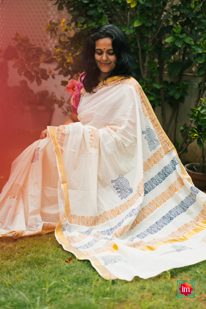White-Onam-Kasavu-Elephant-Motif-Jugalbandhi-Saree-Pooram-1-The-Indian-Motif
