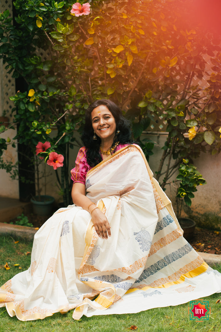 White-Onam-Kasavu-Elephant-Motif-Jugalbandhi-Saree-Pooram-2-The-Indian-Motif