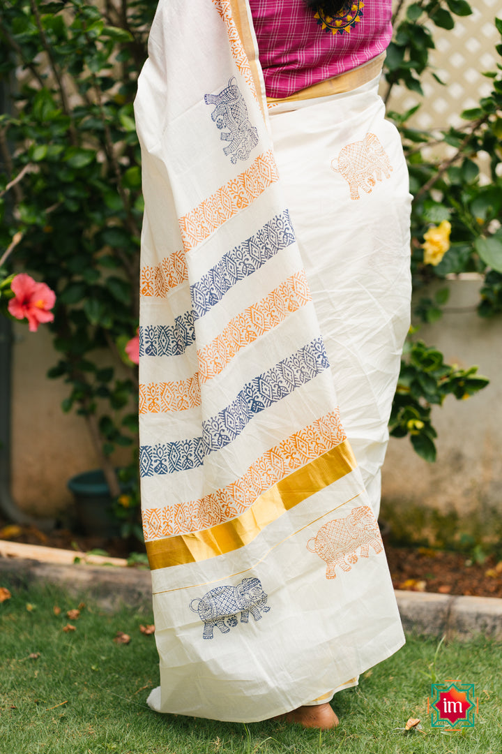 White-Onam-Kasavu-Elephant-Motif-Jugalbandhi-Saree-Pooram-3-The-Indian-Motif