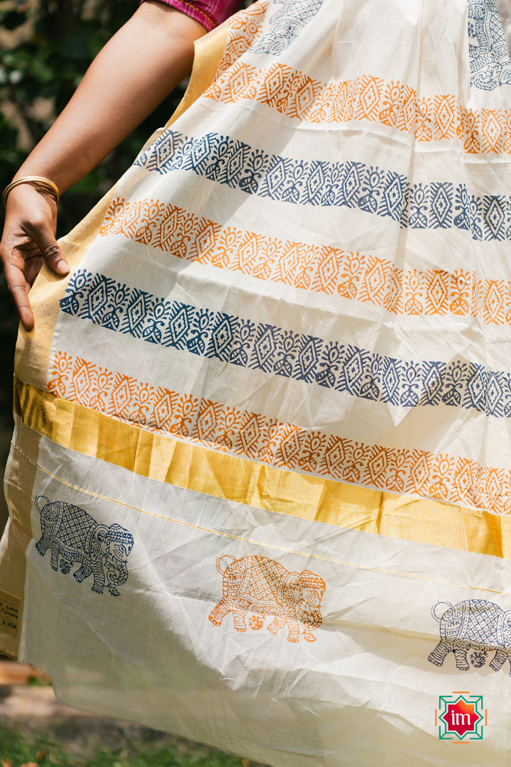 White-Onam-Kasavu-Elephant-Motif-Jugalbandhi-Saree-Pooram-4-The-Indian-Motif