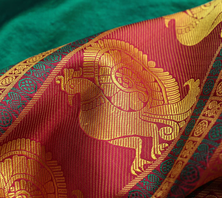 arani threadwork bottle green saree